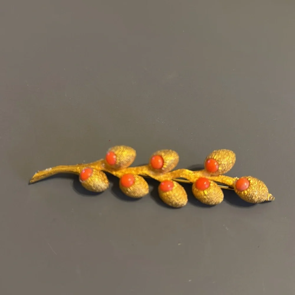 Gorgeous gold tone nugget branch brooch with coral colored beads